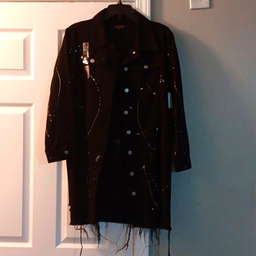 Kroix brand size small black & white distressed jean jacket.